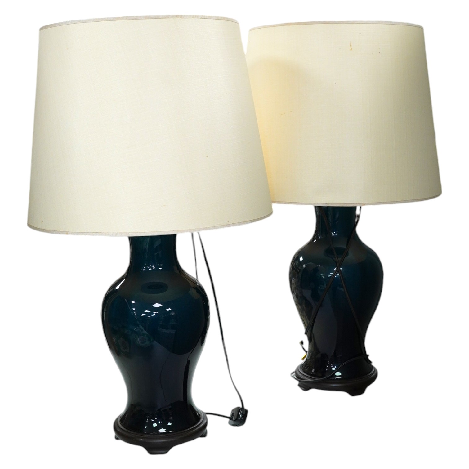 A pair of Chinese teal green glazed lamps and shades, total height 70cm. Condition - good, not tested